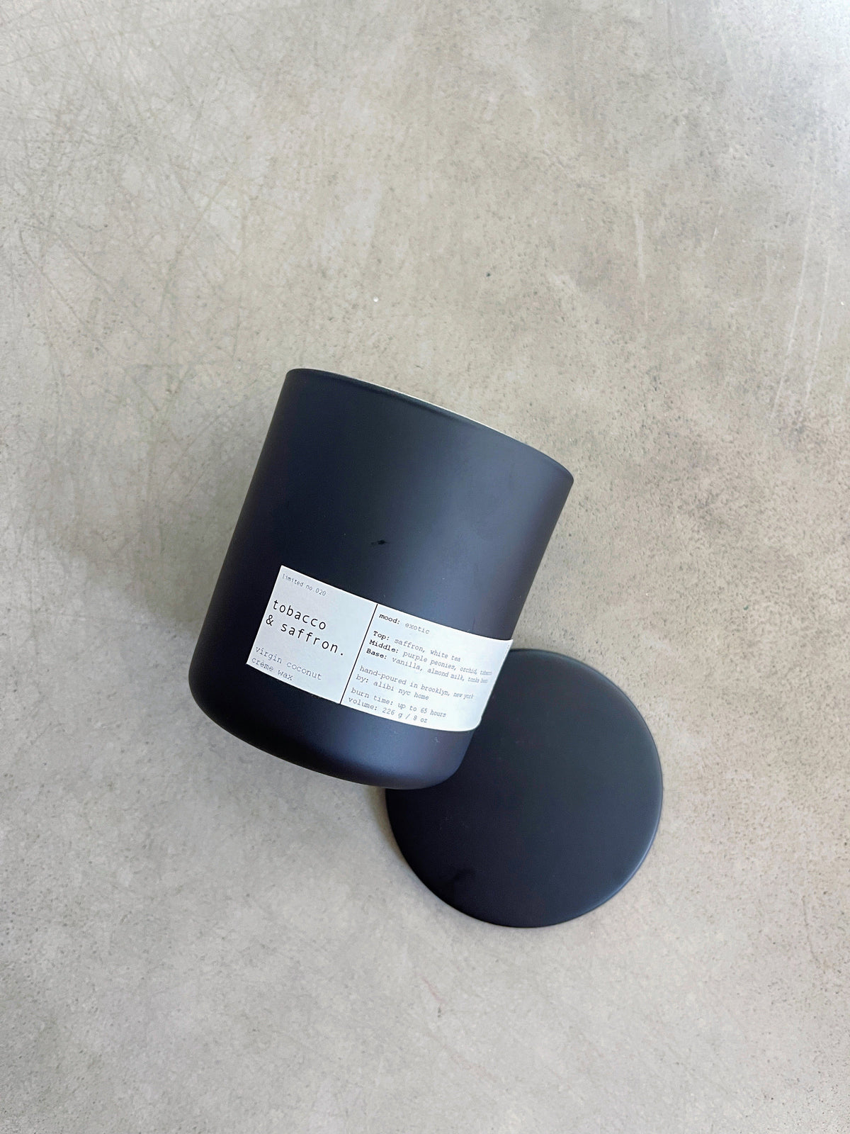 Tobacco and Saffron candle with its matte black lid