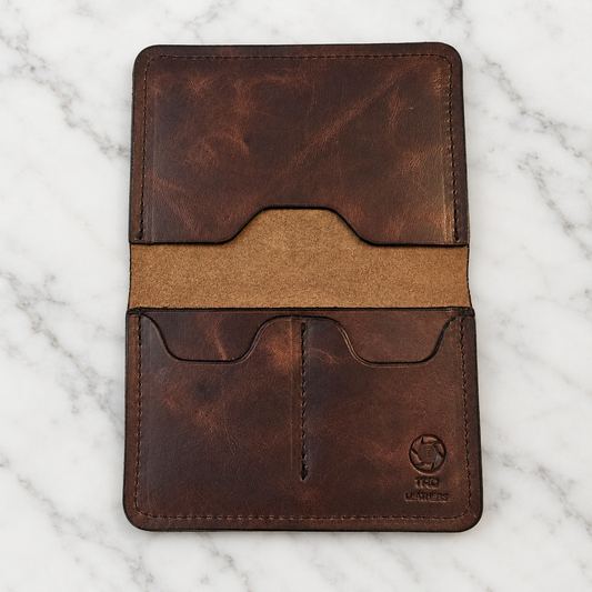 Voyager brown full-grain leather passport holder from Maison Creole Compass