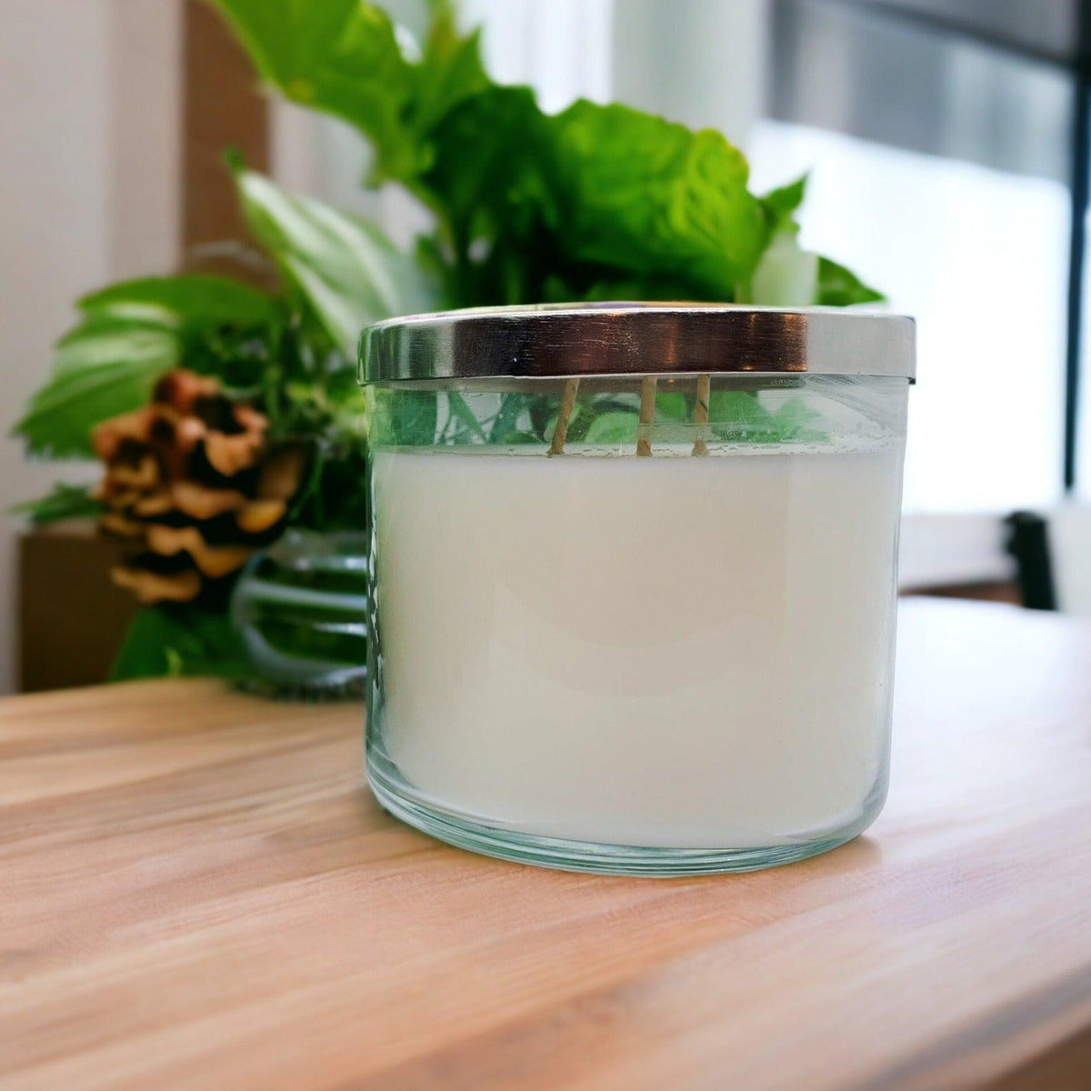 Gia large 3-wick soy candle in a clear glass jar