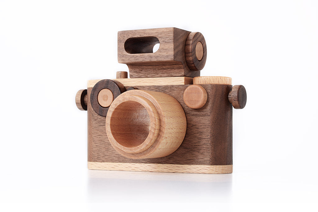 Walnut and beechwood vintage 35mm style wooden toy camera from Maison Creole Compass