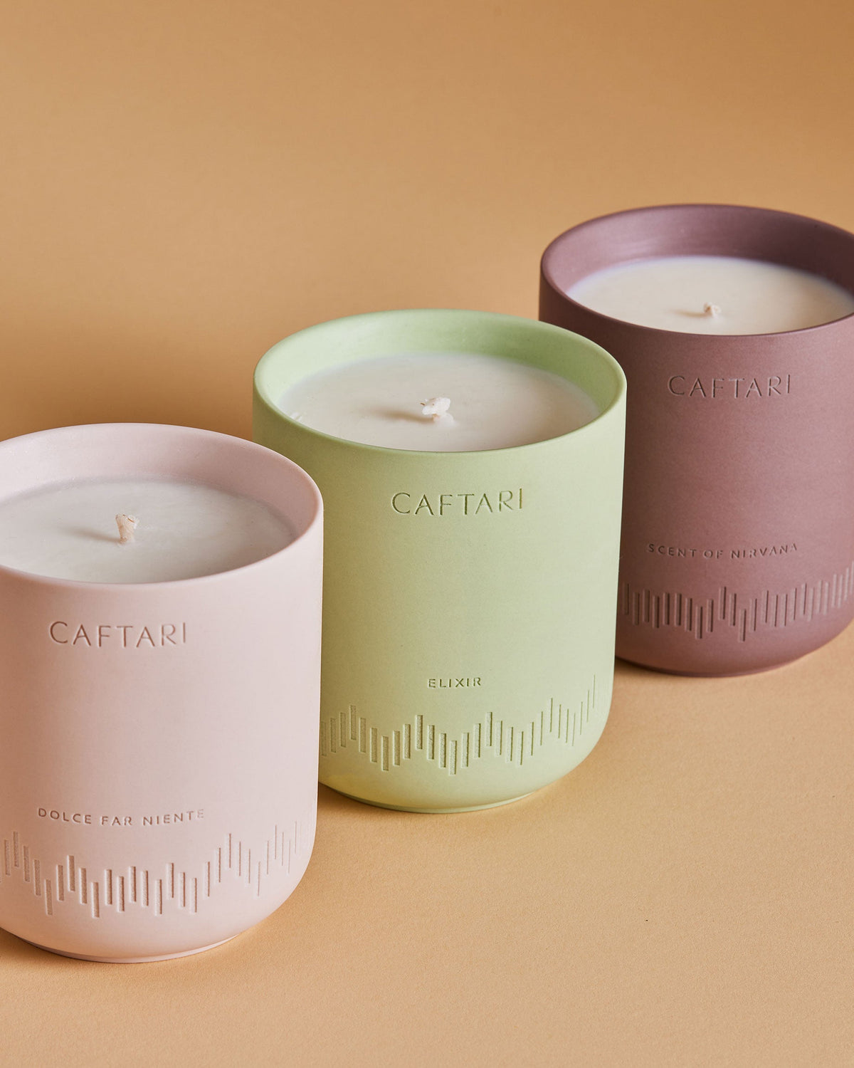 Signature Trio candles in blush, sage and plum