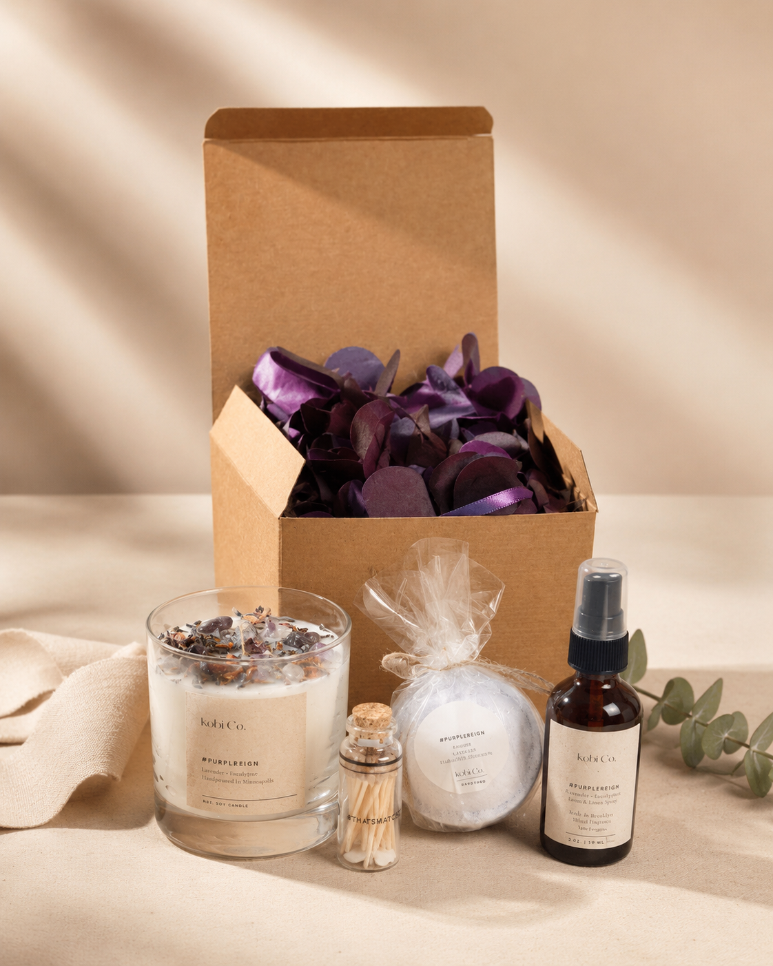 PurpleReign self-care gift set with candle, spray and bath bomb from Maison Creole Compass