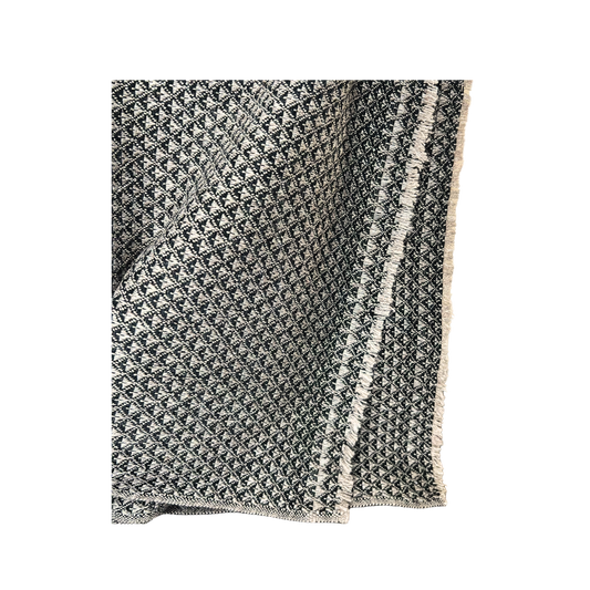 Dhanvi charcoal cashmere throw blanket handmade in Nepal from Maison Creole Compass