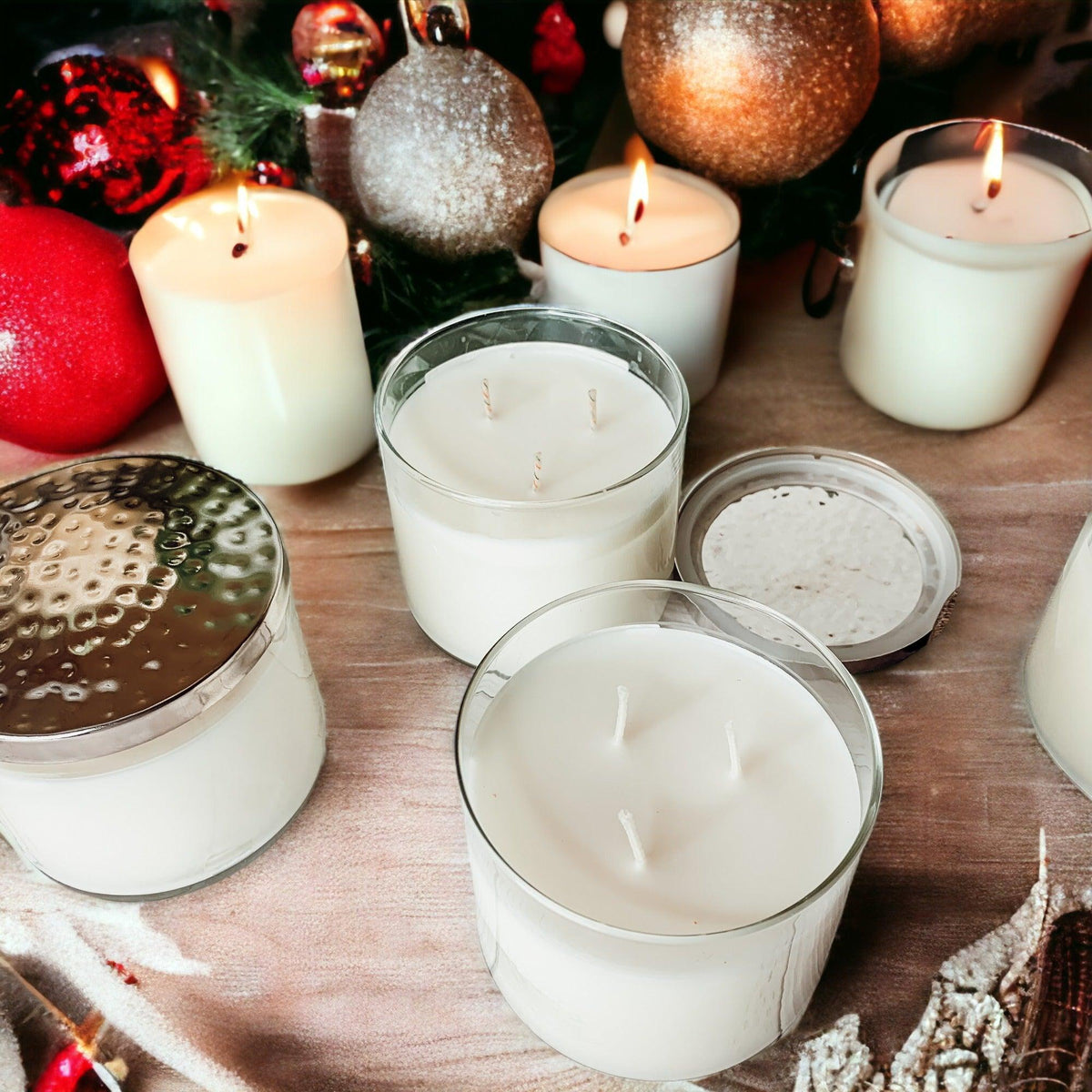 Gia 3-wick candles lit on a holiday table