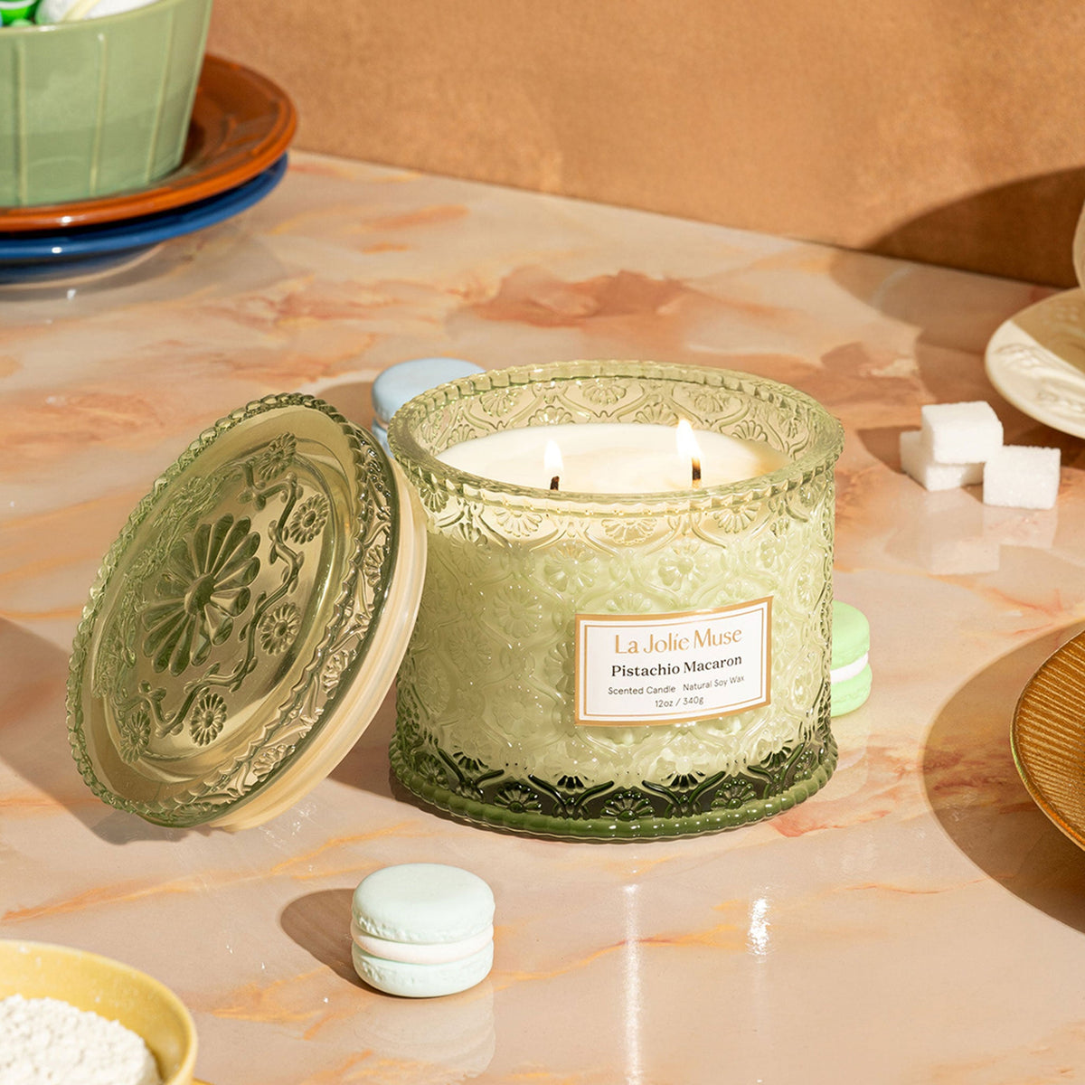 Pistachio Macaron 12 oz luxury candle in embossed glass, view 3