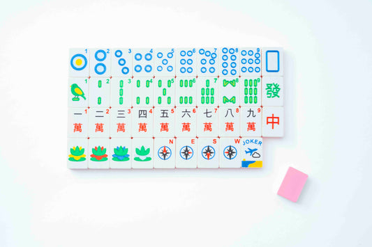 Compass American mahjong tile set laid out, from Maison Creole Compass