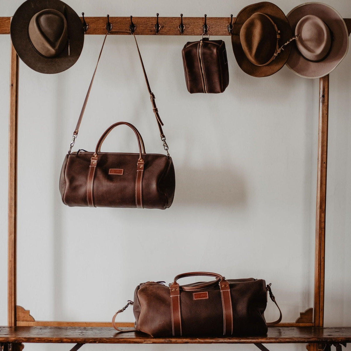 Nomad leather duffle in Chocolate, Daytripper size